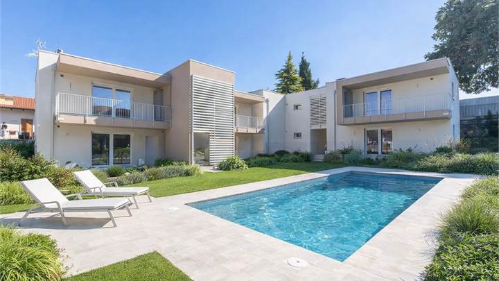 NUOVO TRILOCALE CON GIARDINO RESIDENCE CON PISCINA.